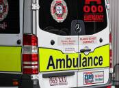 Several ambulances were sent to the scene of the crash in Brisbane's Legacy Way Tunnel. (Russell Freeman/AAP PHOTOS)