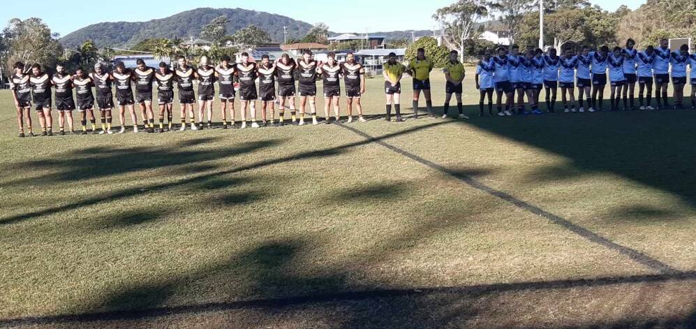 South West Rocks Marlins and Bowraville Tigers observe a minute silence for John Elford before the game. Picture supplied