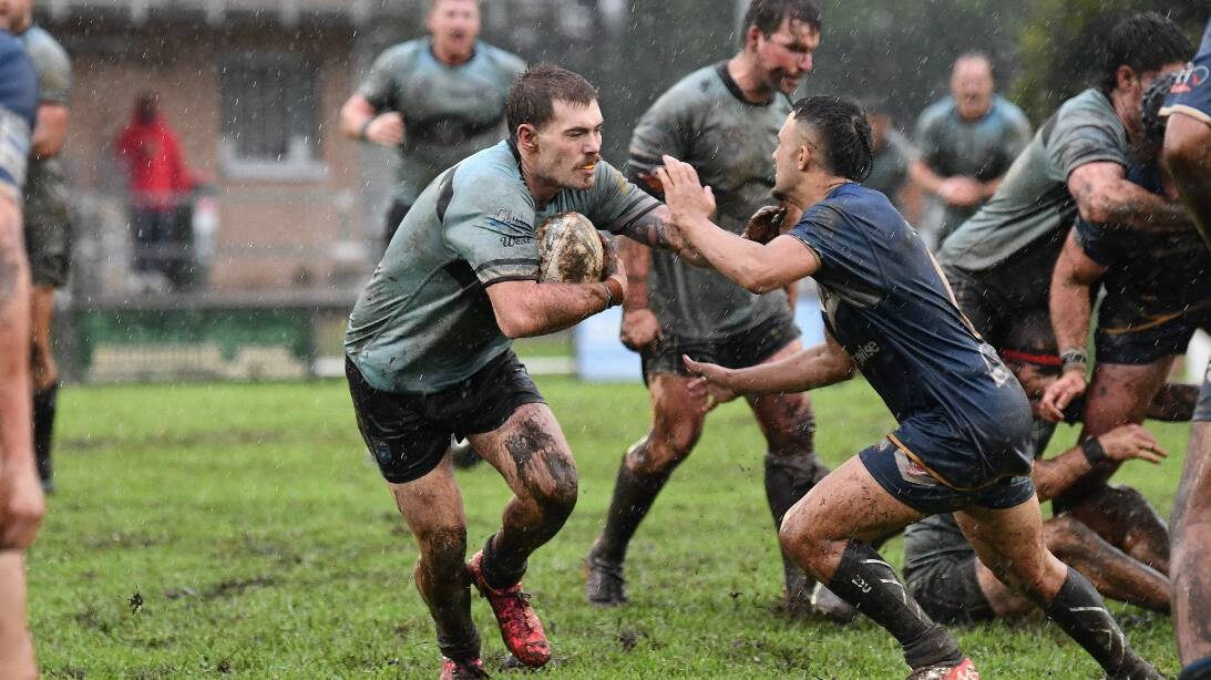 Port Macquarie Sharks and Macleay Valley Mustangs battle the elements in an early 2024 Group 3 Rugby League clash. The Sharks have had their July 6 game postponed while the Mustangs' game is so far safe. 