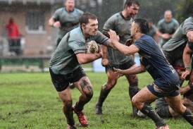 Port Macquarie Sharks and Macleay Valley Mustangs battle the elements in an early 2024 Group 3 Rugby League clash. The Sharks have had their July 6 game postponed while the Mustangs' game is so far safe. 