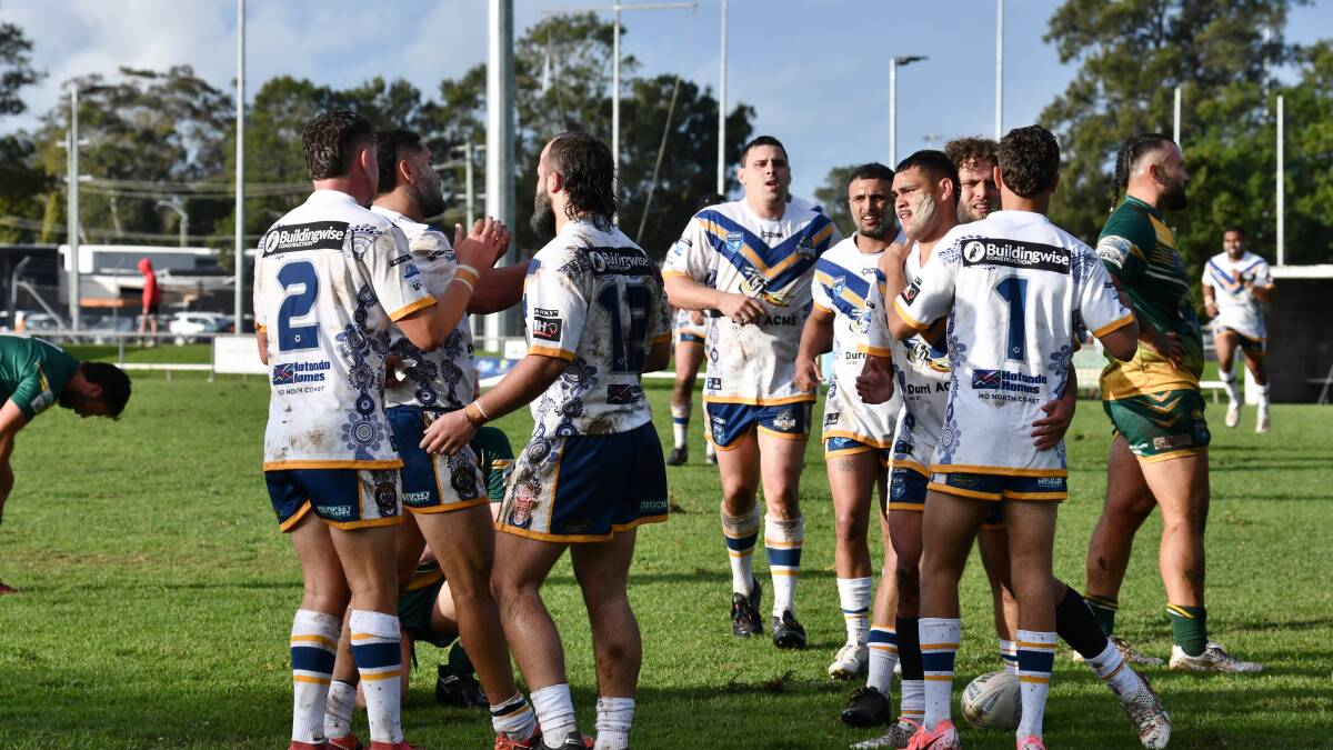 Mustangs celebrate a try in their clash against the Hawks at Verge Street Oval on Sunday, July 7. Picture by Penny Tamblyn 