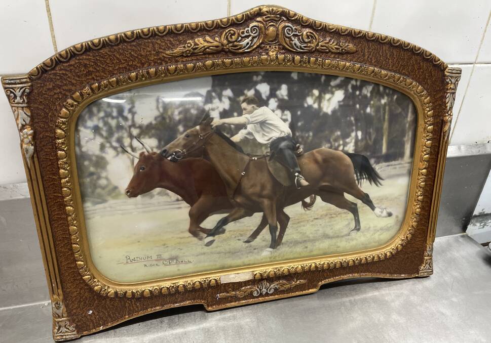 It rides in the family: Father of Colin and founder of Balls Butchery, Charlie Ball, rides 'Radium III'. This framed picture hangs on the butcher shop wall. Picture by Ellie Chamberlain.