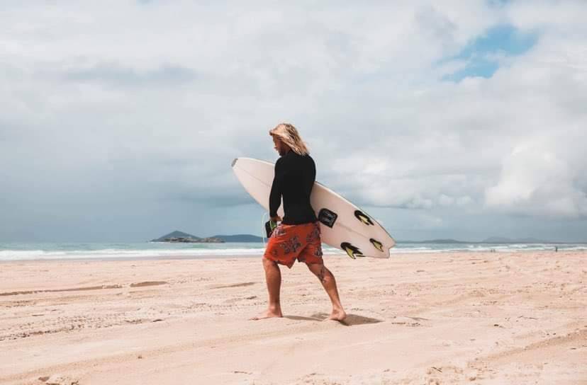 Louis Hogno (pictured) says coming face-to-face with a shark while surfing is 'luck of the draw'. Picture by Clare Dennis