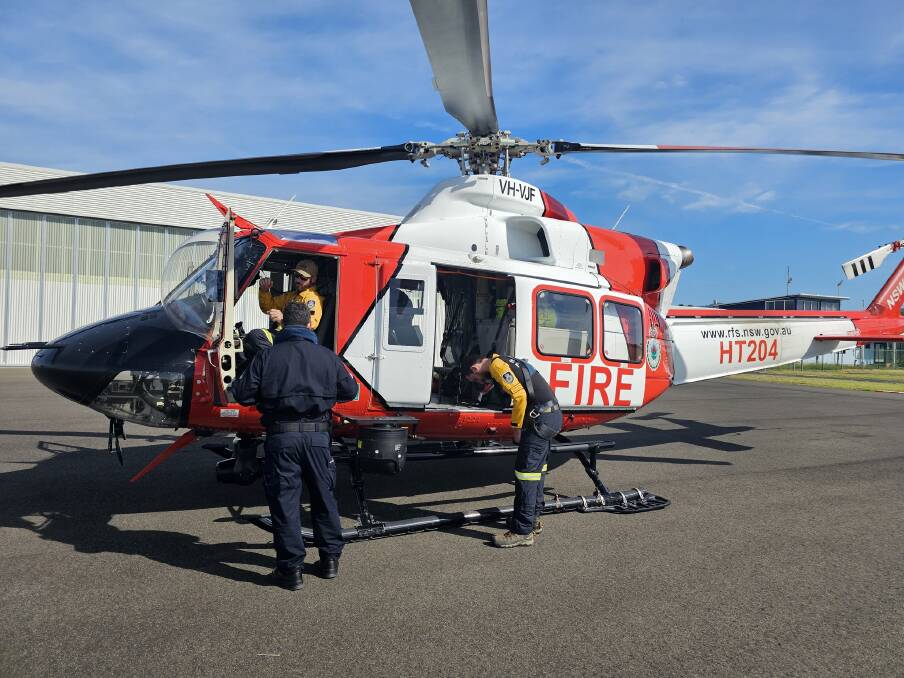 The RFS helicopter is based in Coffs Harbour and will journey between South West Rocks and Red Rock during the weekends until the beginning of April 2024. Picture NSW RFS.