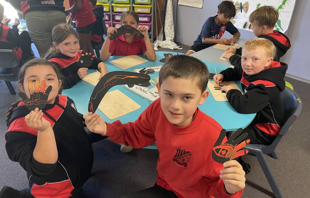 Schoolchildren get creative during their 2023 NAIDOC day at Kempsey South Public School. Picture by Ellie Chamberlain