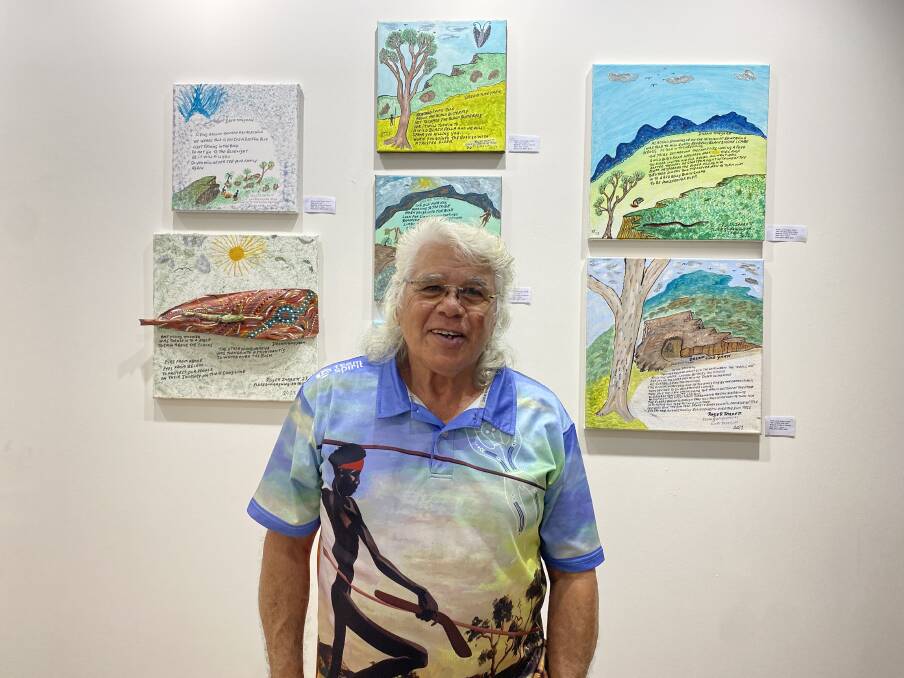 Uncle Roger Jarrett stands with his "yarn" works inspired by stories he was told as a boy to keep him safe. Picture by Ellie Chamberlain