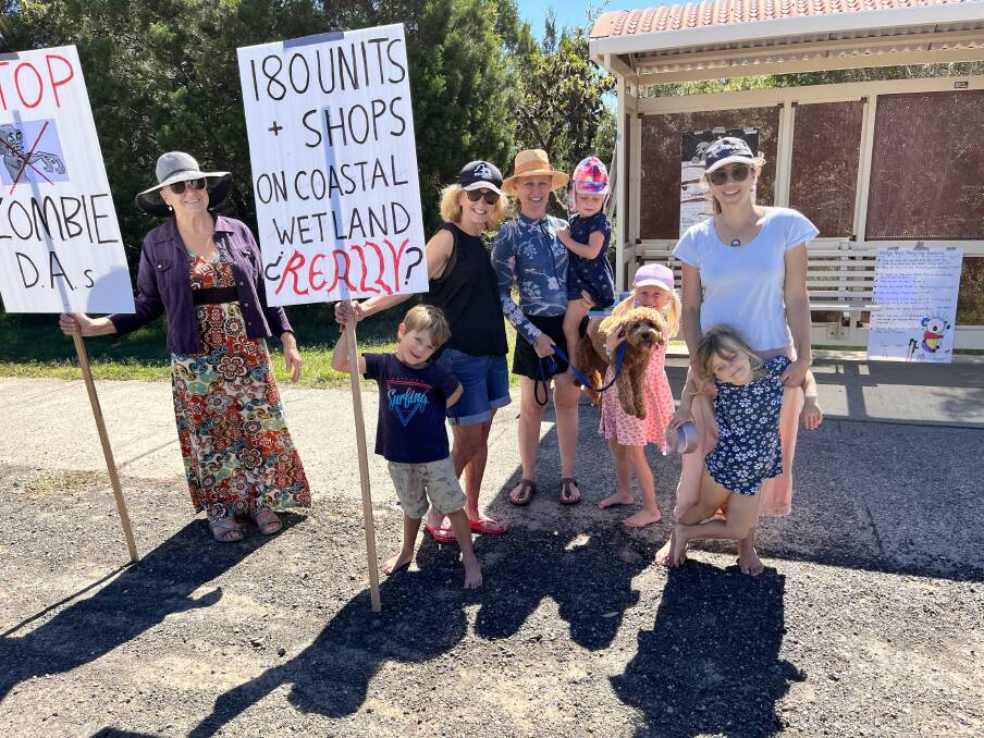 A vigil out the front of Rise Development at South West Rocks has been a daily occurrence since land clearing commenced (L-R) Gaye Beathe, Bede Hogan, Jenny Hogan, Yvette Colegrave, Saskia Colegrave, Siena Colegrave, Cherry Muddle, Rumi Hogan. Picture supplied Cherry Muddle