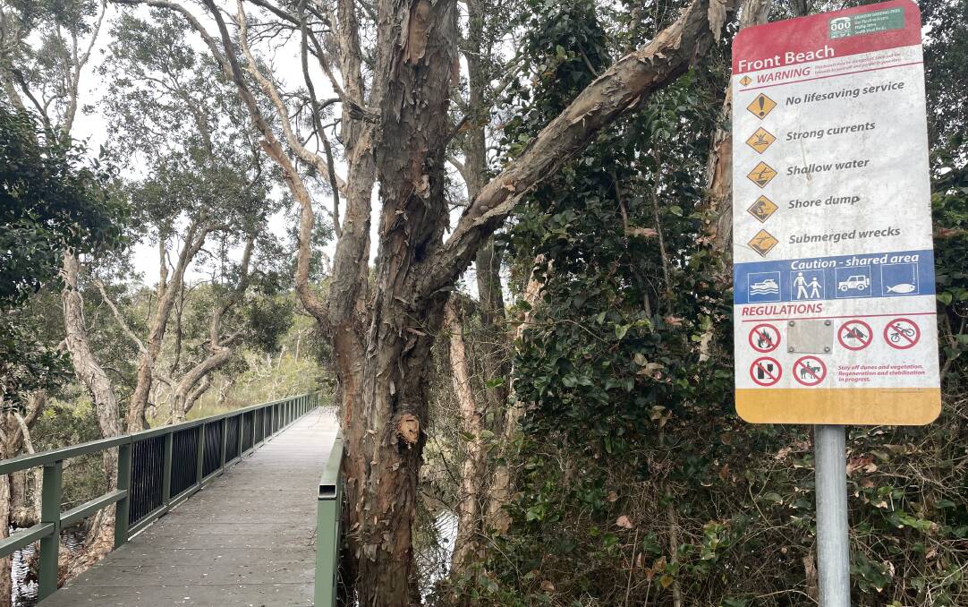 'No dogs' sign recently covered up at the beach access off Phillip Drive, South West Rocks. Picture Ellie Chamberlain