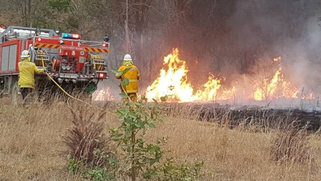 Grassfires like this one at South West Rocks are more likely to occur now with warm weather in the upcoming months. Picture supplied by NSW RFS Lower North Coast