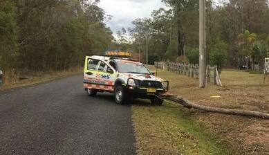 SES crews at Settlers Way off Crescent Head Road. Crescent Head Road was closed due to fallen power lines. Picture supplied by NSW SES Kempsey Shire unit