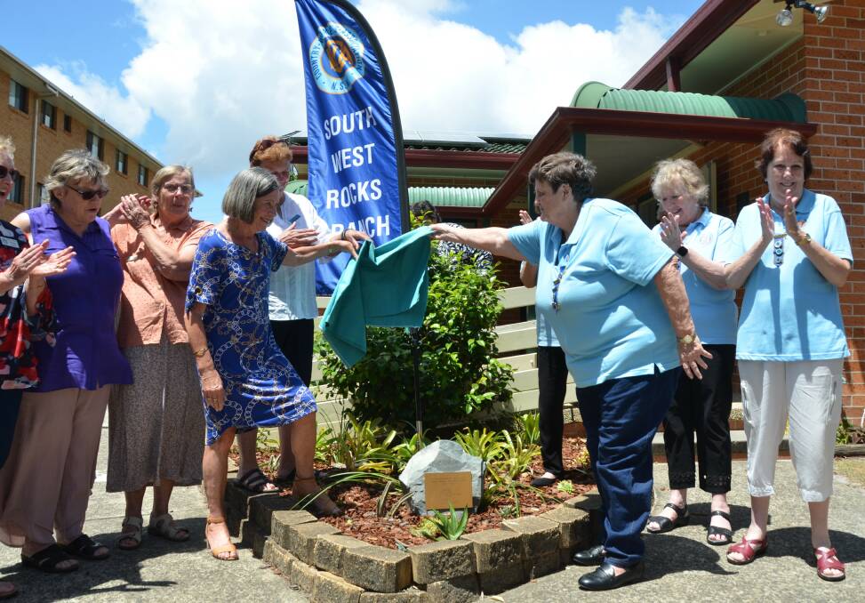 CWA Mid North Coast group president Rhonda Merchant and CWA South West Rocks branch president Lynn Gibson unveil plaque commemorating 100 year anniversary of the NSW CWA. Picture by Emily Walker