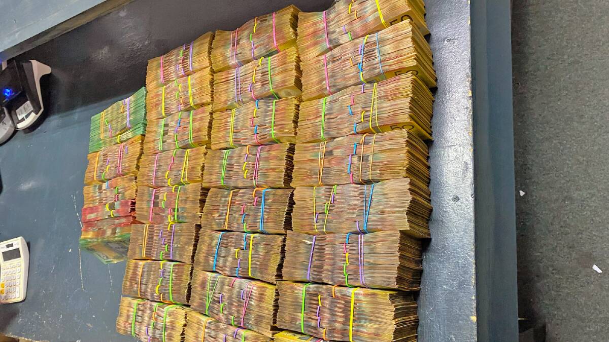 Police seized $830,000 in cash from the passenger's bags. Picture supplied