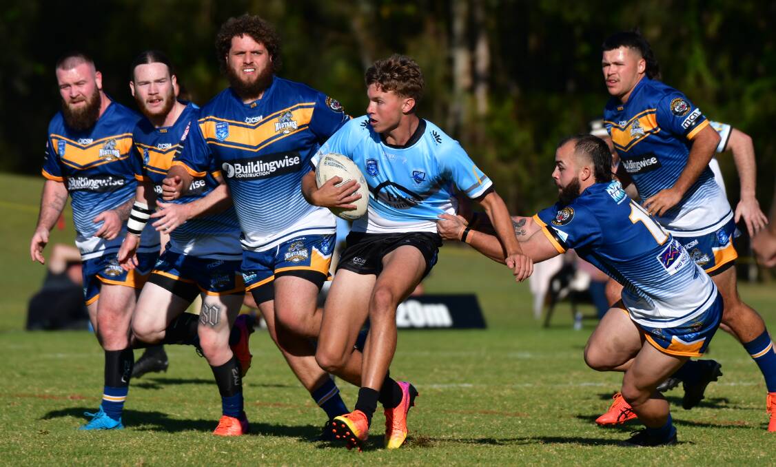 Port Sharks' fullback Corey Lewis looks to evade the Macleay Valley defence. Picture by Paul Jobber