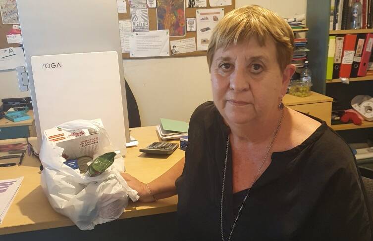 PRICE CHECK: Kempsey Neighbourhood Centre manager Shirley Kent with an emergency bag of groceries the cost of which has increased by 25 per cent. Picture: supplied.