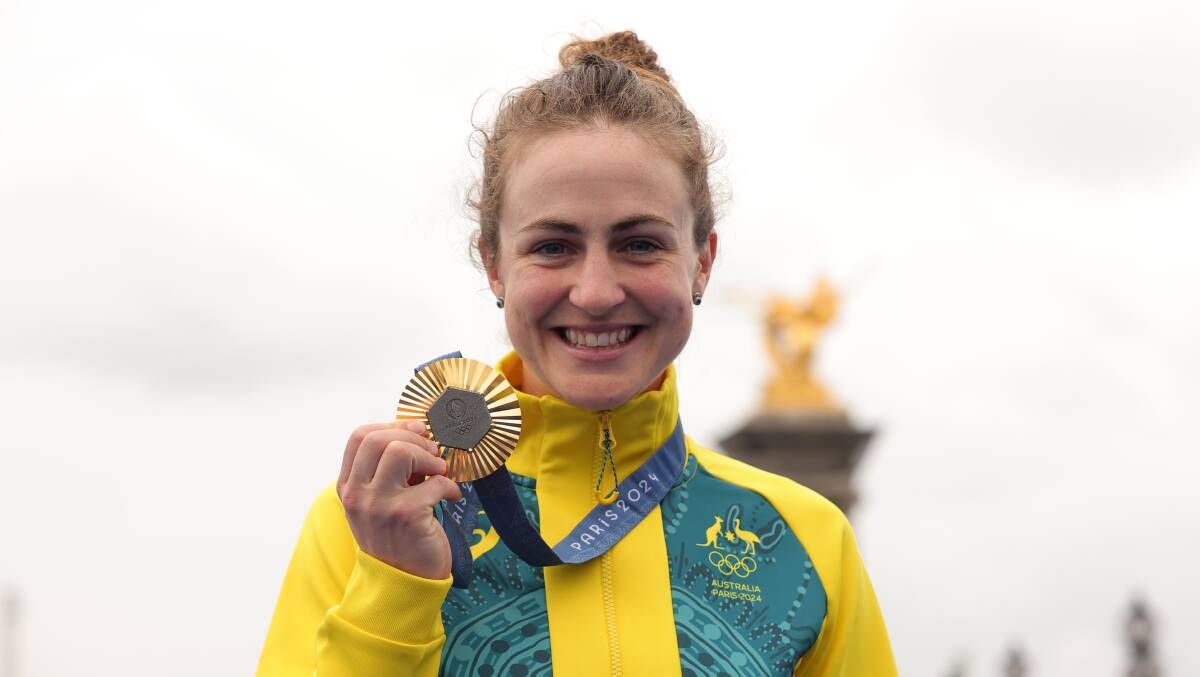 Grace Brown after winning gold in the time trial. Picture AAP