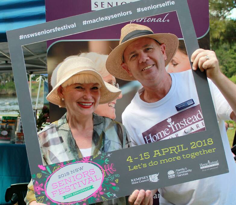 Mayor Liz Campbell and principal sponsor Rod Lewis Director of Home Instead Mid North Coast celebrating the Seniors Festival at Riverside Markets in 2018.