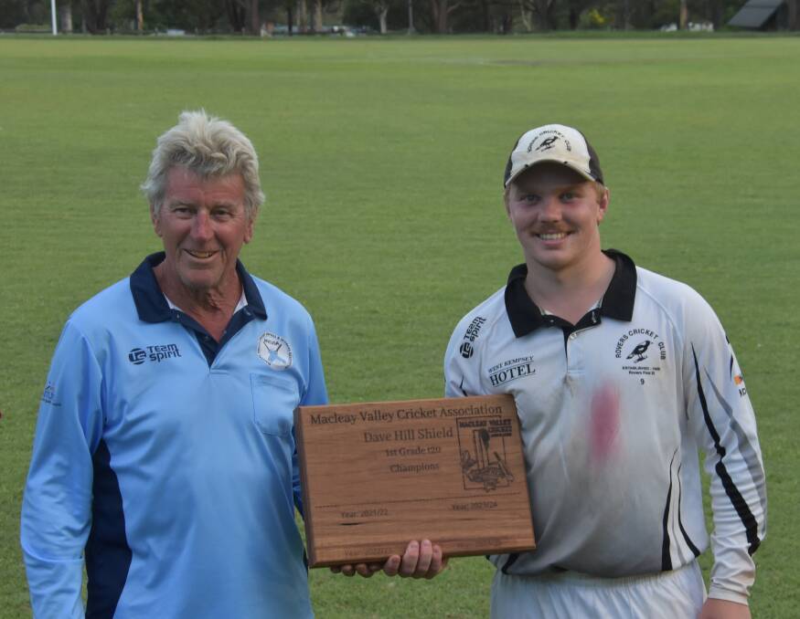 Dave Hill presents the Shield to Rovers WKH captain Jackson Korn. Photo: Lachlan Harper 