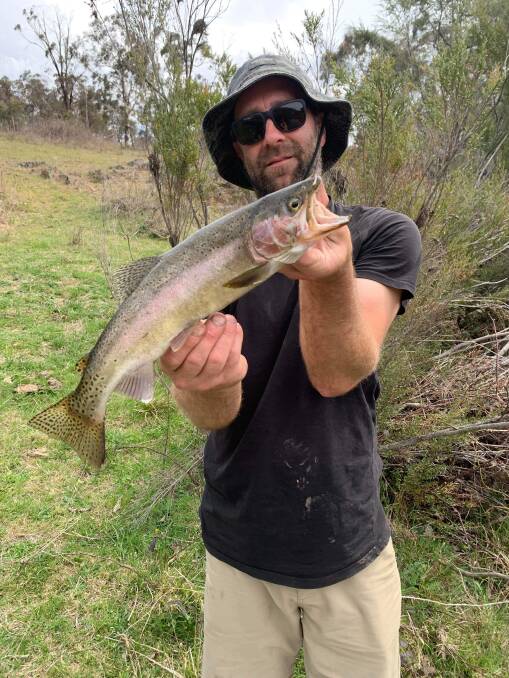 David Henry and his son Olly ventured west during the school holidays and had a fantastic time catching trout on a property near Armidale. Picture: supplied. 
