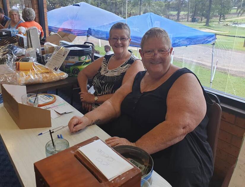 Volunteers: Lucy Perrin (front) and Lyn Peters sold raffle tickets at the event. 