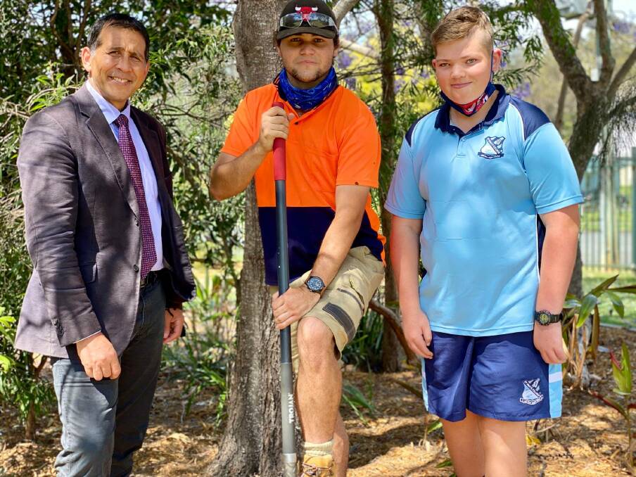 Principal of St Paul's College, David Johns with former student, now College groundsman, Craig McGoldrick and Student Representative Council member Hunta Crilley. Photo: St Paul's College.