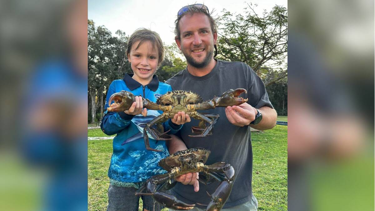 Ollie and Brendon Roods, father and son duo with some huge mud crabs caught in the Hastings River over the long weekend. Picture, supplied