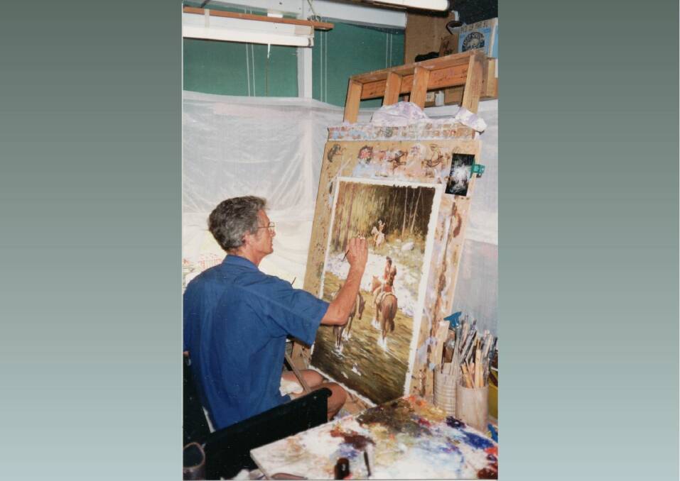 Stephen Franks at work on one of his paintings. Picture by Annie Reynolds