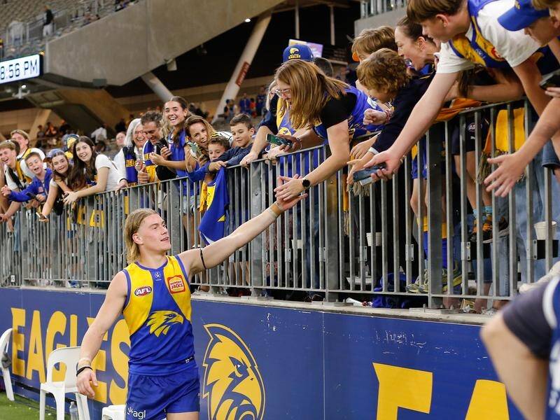 Harley Reid soaks up the adulation of fans after his magnificent display for the Eagles in Perth. (David Woodley/AAP PHOTOS)