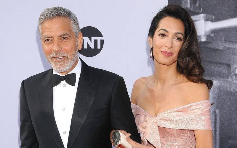 George Clooney and Amal Alamuddin Clooney at a Hollywood ceremony celebrating his achievements. Picture File