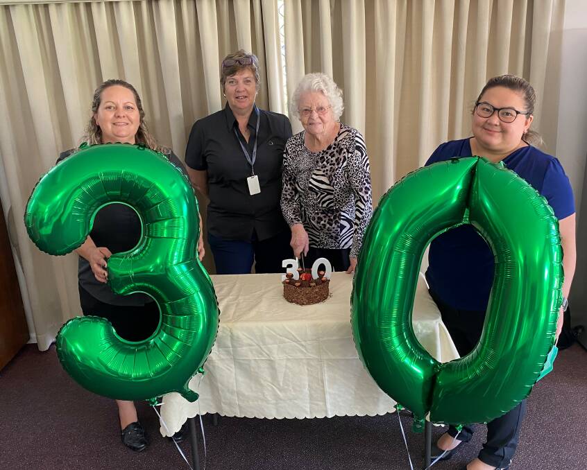 Kate (Kit) Wickham, a founding board member of the Macleay Senior Citizens Home Inc, known as Cedar Place was only to happy to help celebrate the 30th birthday of the facility she helped build. Photo: Supplied 