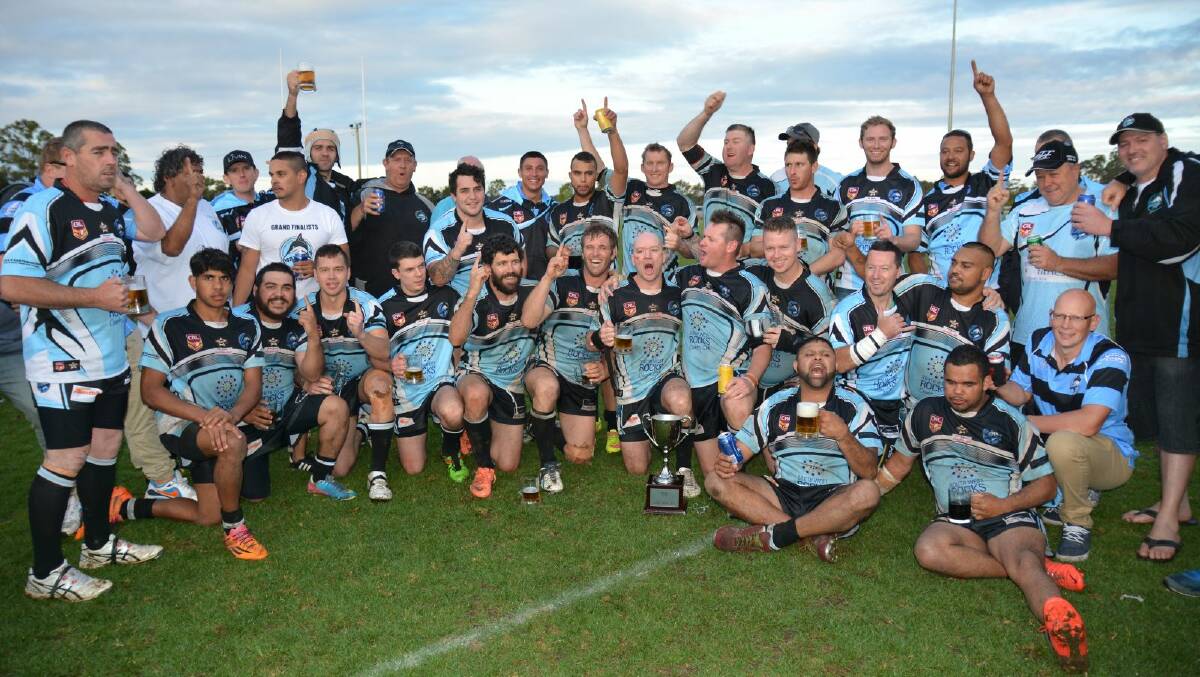 Sweet victory: The South West Rocks Marlins celebrate their win against the Lower Macleay Magpies to claim the 2015 Hastings League grand final.  Photo: Penny Tamblyn 