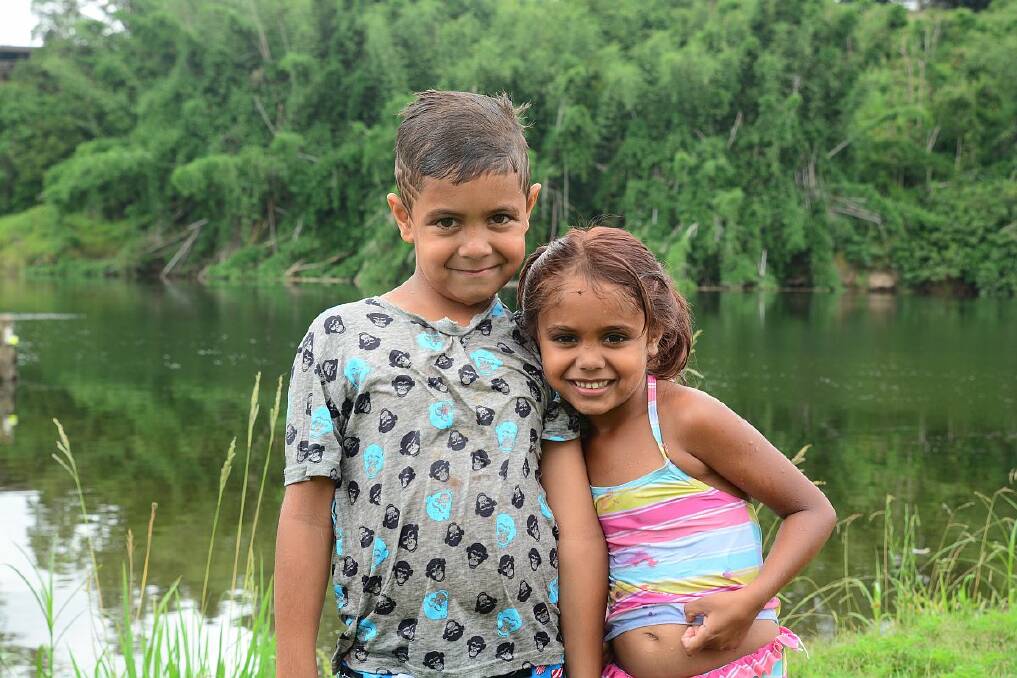 Jalahra and Marley Cameron immediately left the water after reports of a possible shark sighting in the Macleay River this morning (pic Todd Connaughton) 
