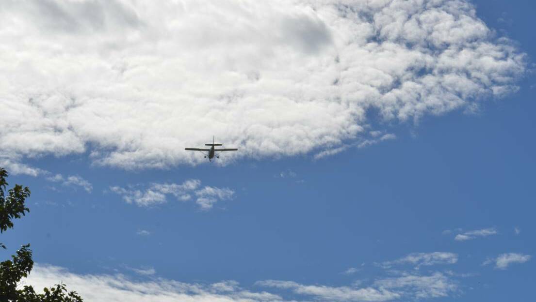 One of the small planes which flew overhead during the ANZAC Day service at Gladstone